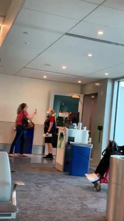 Karen having a meltdown in a airplane terminal
