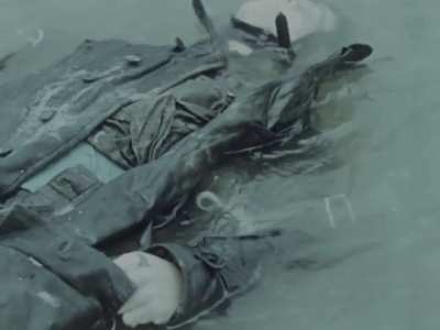 The remains of a Soviet airman in a river on the Eastern Front in 1942