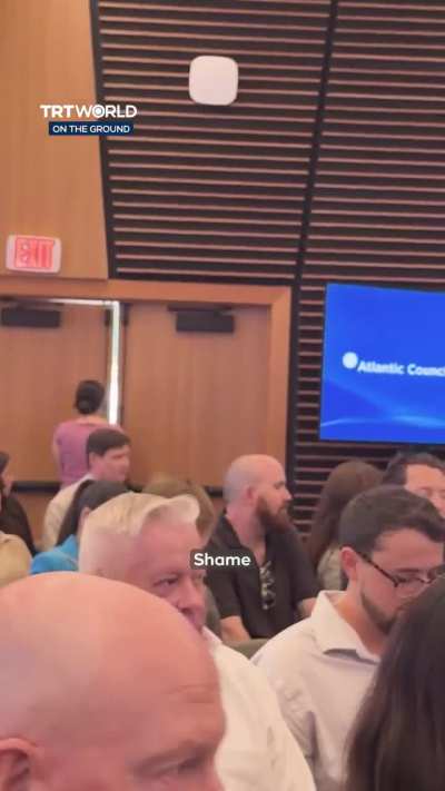 Air Force veteran Corey Walden interrupted an Atlantic Council event, confronting Senator Thom Tillis over his support for Israel.