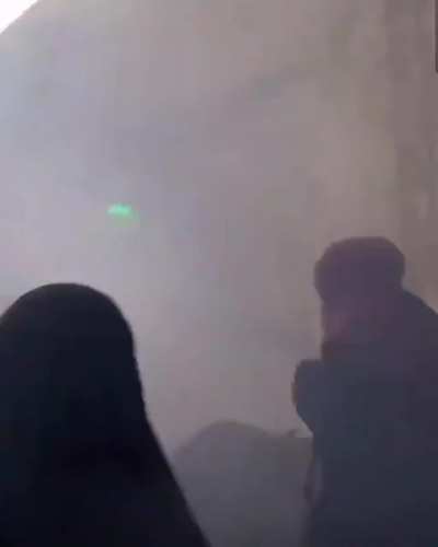 Israeli troops storming in throwing grenades and tear gas in the womens and kids section of the mosque