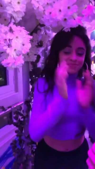 Shaking her tits