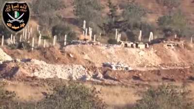 FSA BGM-71 TOW team hits a dug-in Syrian Army gun emplacement - Morek - 7/5/2015