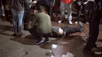 Drunk guy tries to start a fight and gets knocked out and arrested. Video was shot in 4K resolution.