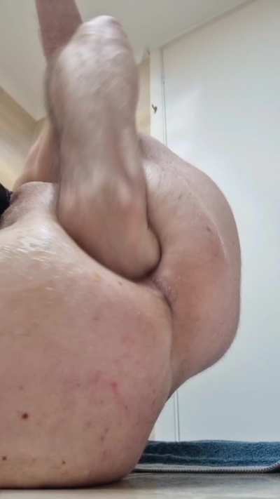 Self-fisting ass with slow motion rosebud rub