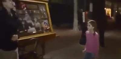 Little girl tries to shut down street preacher