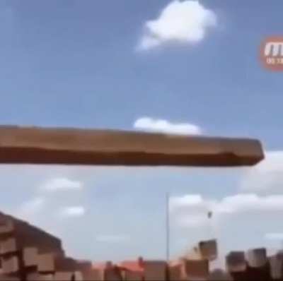 An excavator using a rope and lever technique to move materials it wasn&rsquo;t originally designed to move
