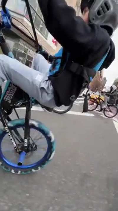 Dude helps a kid master his wheelie and hypes him up along the way. Super wholesome 😇