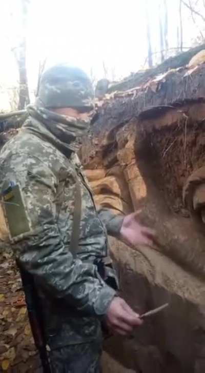 ua pov - Ukrainian soldier practices art during the downtime in the trenches