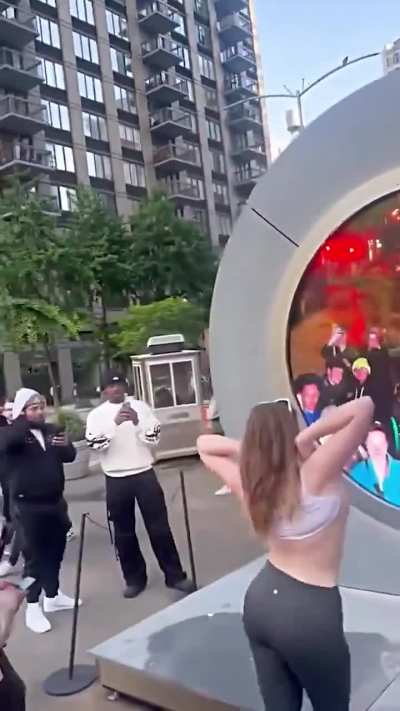 Woman flashes her boobs in New York at Dublin to NY portal