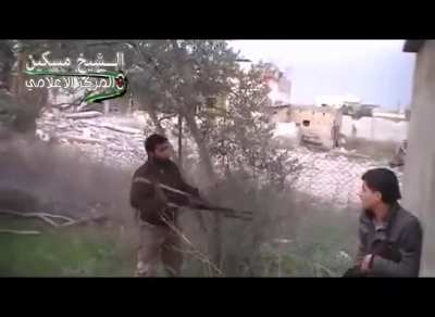 FSA fighter engaging Syrian Army positions with what appears to be a sporterized rifle - al-Shaykh Maskin - 2014