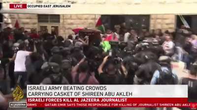 Israeli occupation forces are attacking Palestinians during the funeral of killed Al Jazeera journalist Shireen Abu Akleh.
