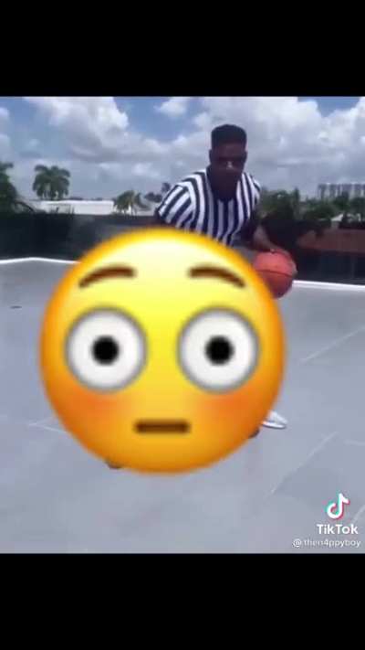 DaBaby playing basketball after getting a new haircut