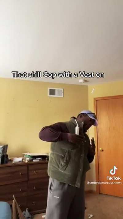 Cop with vest on