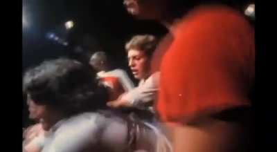 Fans invading the stage during a FEAR concert in 1980