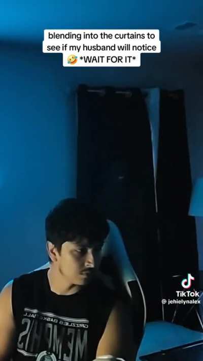 Blending into the curtains prank