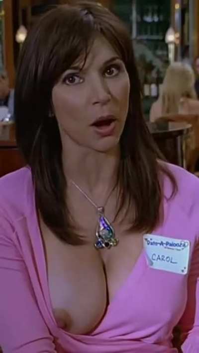 Kimberly Page's big titty pops out and her top gets caught on her hard nipple in 