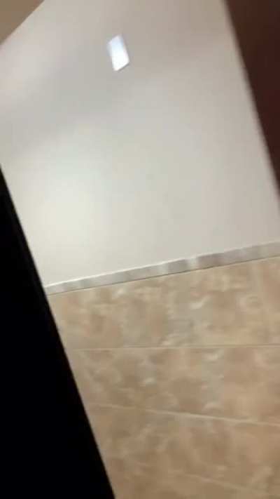 She got scared cleaning the bathroom with headphones in