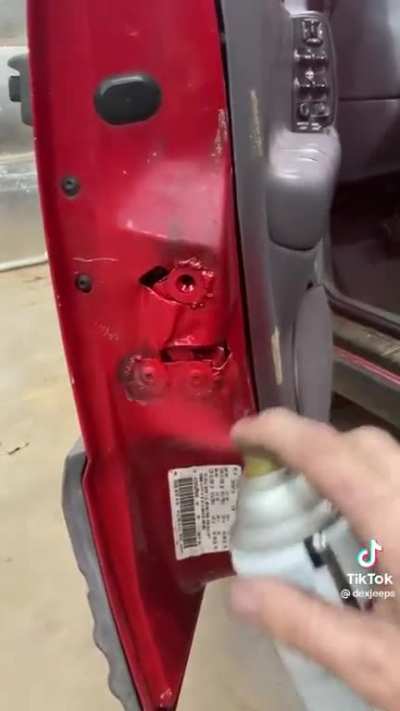 Just a guy spray painting his vehicle