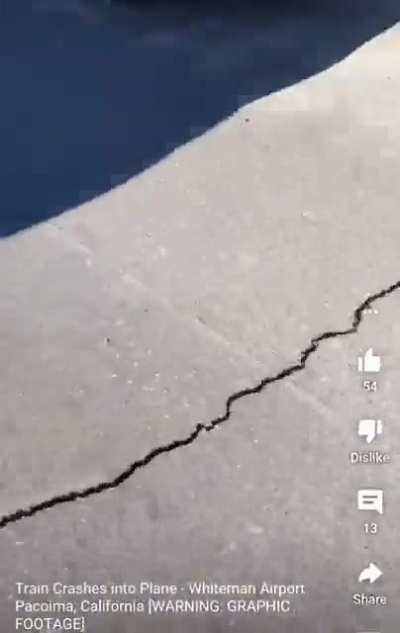 Recording a train hitting a crashed plane