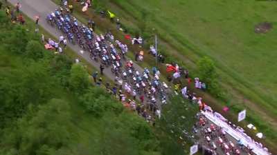 Fan with sign at Stage 1 of Tour de France takes out peloton
