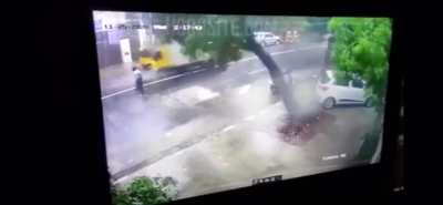 Man walks in the middle of the road