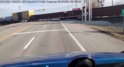 Norfolk Southern Train derails in Clark county, Springfield, OH. 03/04/2023. Note the low spot in the tracks near the left side of the crossing. You can see the locomotives and cars appear to lurch up.