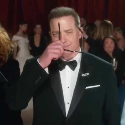 Brendan Fraser removing glasses as Careless Whisper plays