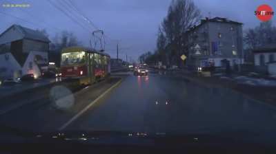 The car turned in front of the tram ...
