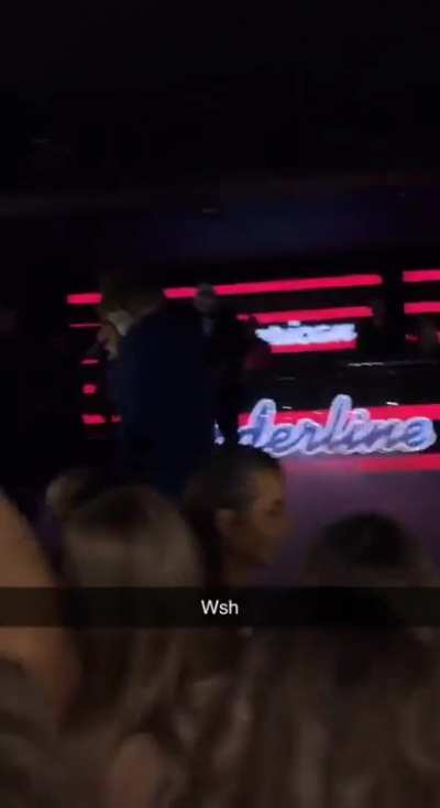 Girl gargles on the Joker&rsquo;s mike at the club