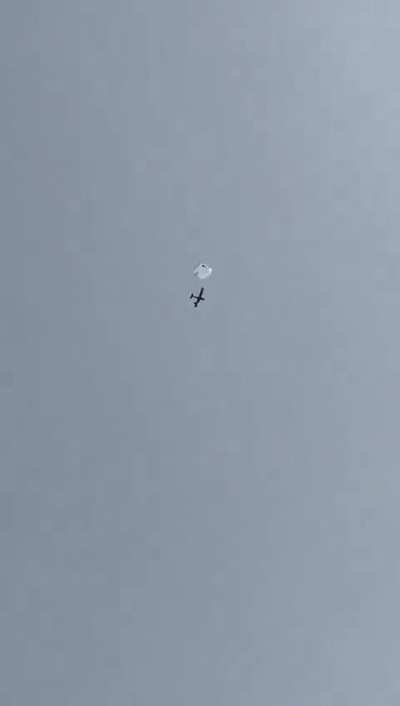 Footage of a Ukrainian soldier shooting down a Russian Orlan-10 reconnaissance drone with a machine gun. 