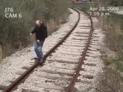 Man gets brutally hit by a train.