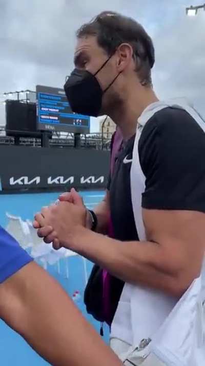 Rafael Nadal apologizing to the crowd for not being able to sign autograph.