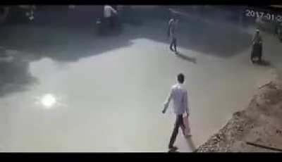 Tackled by a rickshaw.