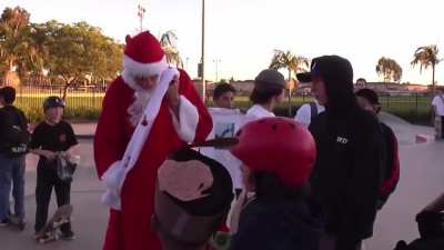 Tony Hawk giving out skateboards and clothing to local kids and then donating tonnes of toys to the Salvation Army, all while dressed as "Santa Hawk".