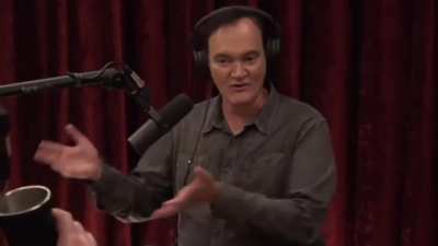 Joe brings up Bruce Lee portrayal and Tarantino tells him to sugg a digg