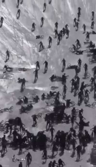 Downhilling an icy track with 700+ mountain bikers at once