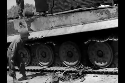 Tiger 221 of s PzAbt 504 knocked out in Cecina by a shot to the side at less 30 yards from a 752nd Tank Battalion Sherman on July 1st 1944