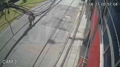 Motorcyclist and pedestrians collide