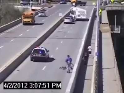 Car hits cyclist and and attempts to flee the scene...at the worst possible time