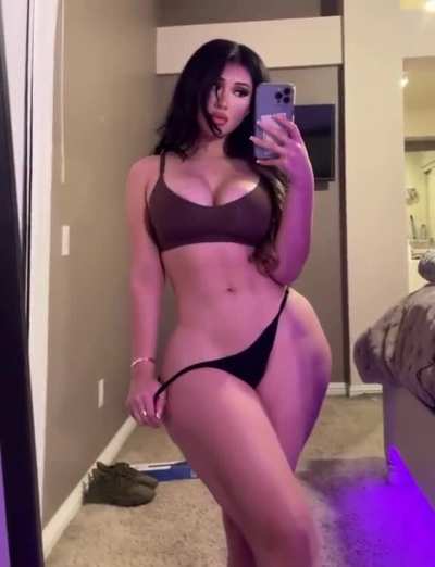 Showing her waist