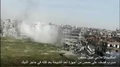 Captured footage of a Syrian ZSU-23-4 Shilka using direct fire on Opposition controlled buildings during the Seige of Homs - 2014