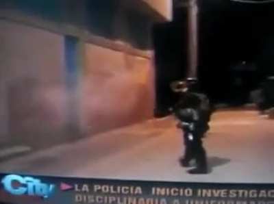 Pushing a cop with full riot gear