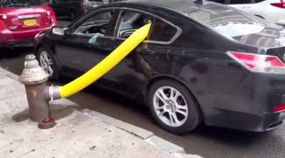 Car parked in front of fire hydrant.