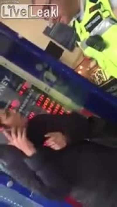Woman gets mad while being asked to move away from the door. The guard responds "I've been called worse"