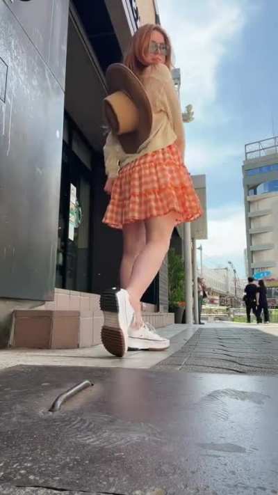Doing a twirl &amp; showing off her legs in Japan (April 2023)