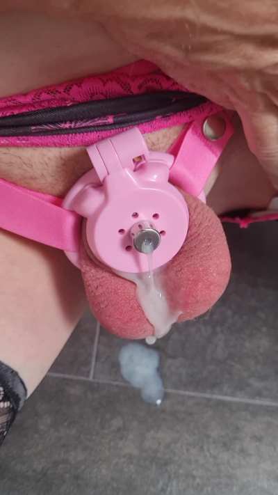 Cumming whilst caged in my tiny pink flat cage, it just keeps cumming out of me