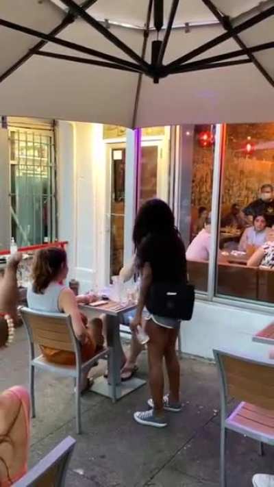 BLM Protesters says people eating at restaurant who don’t raise there fist is a white supremacist.