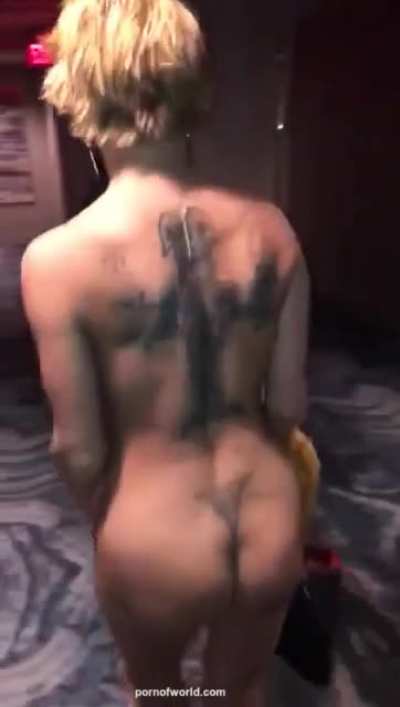 Busty Blonde Removes Dress In Hotel Hallway