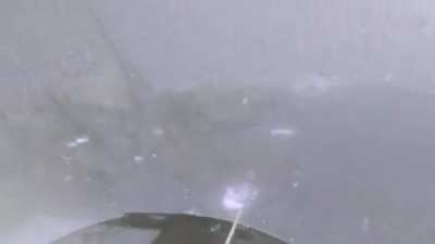 a firework exploding under ice