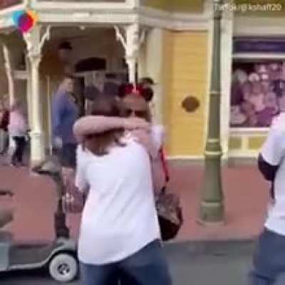 Grandma thought it was just a sweet photo with Grandpa at Disneyland, until her entire family surprised her for her 70th birthday.